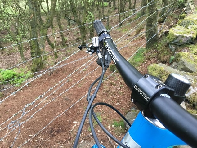 stretching barbed wire