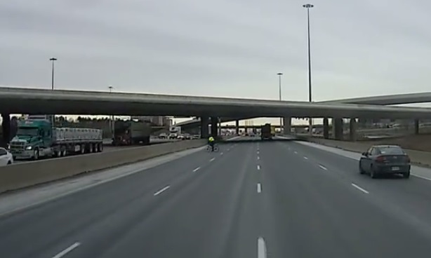 cyclist cuts motorway