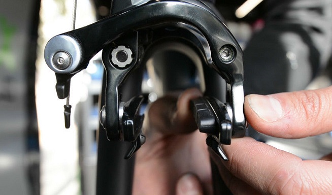 adjusting road bike brakes