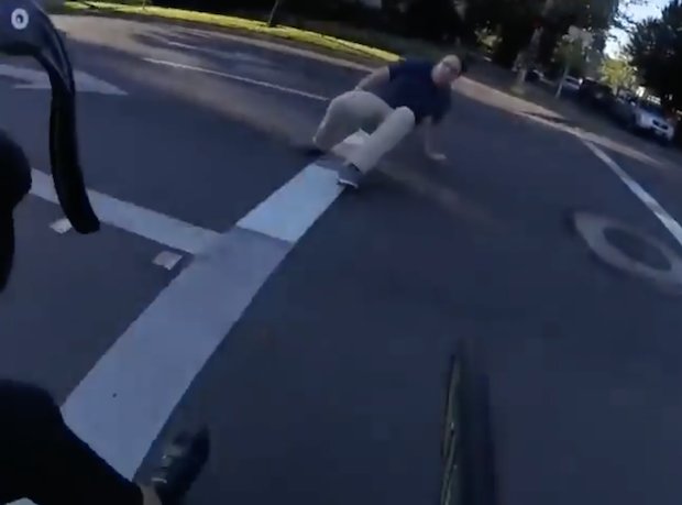 road rage angry driver attacks cyclist