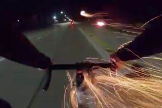 cyclist shots fireworks