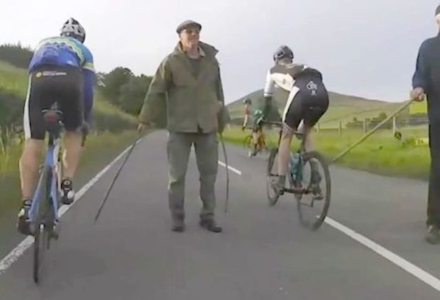 cyclists attacked with sticks