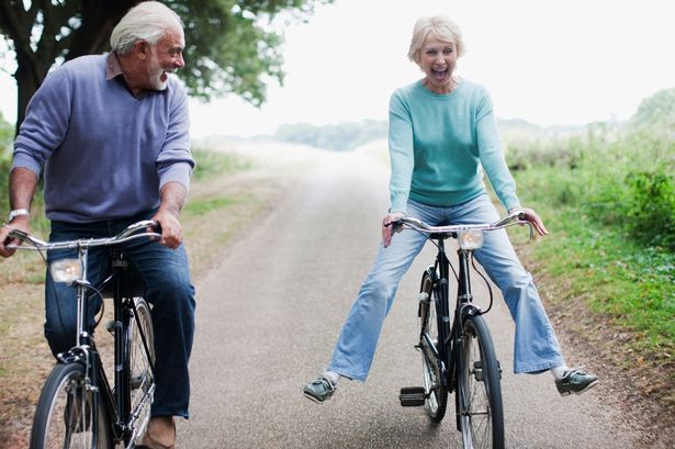 couple riding bicycle