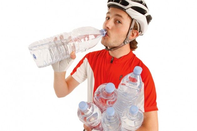 cyclist drinking water boost performance