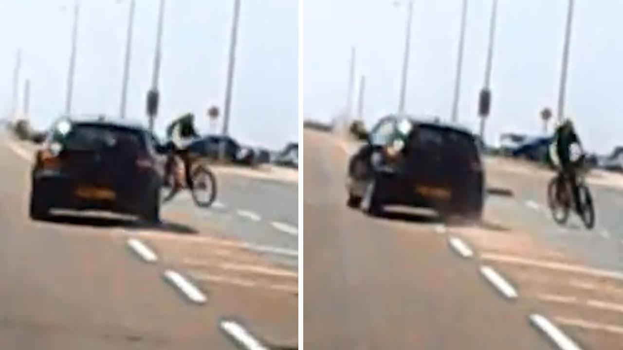 driver swerves towards teenage cyclist