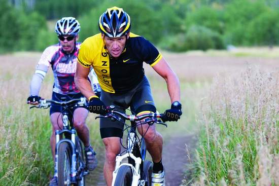 lance armstrong riding bike