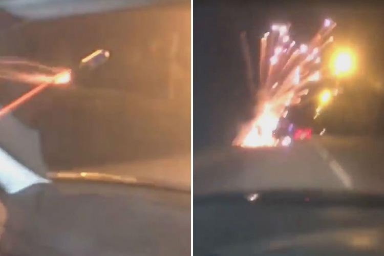 Man launches firework straight at cyclist from moving car