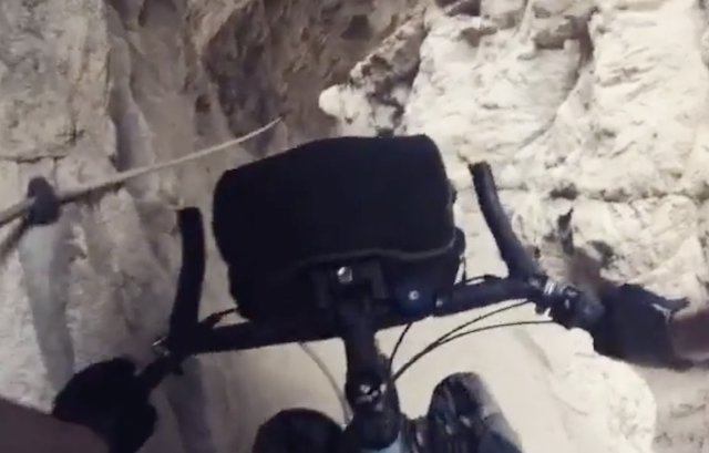 Cyclist rides scariest MTB trail on a touring bike