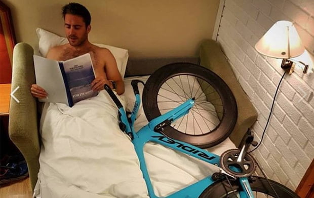 funny cyclist in bed